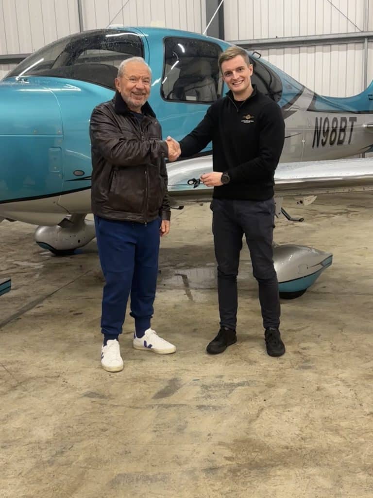 Airplane pilot, Robbie with customer